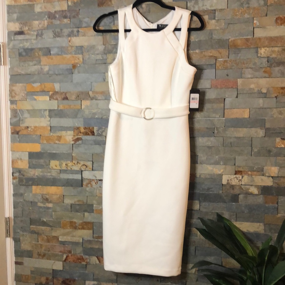 Sleek white dress with subtle gold detail